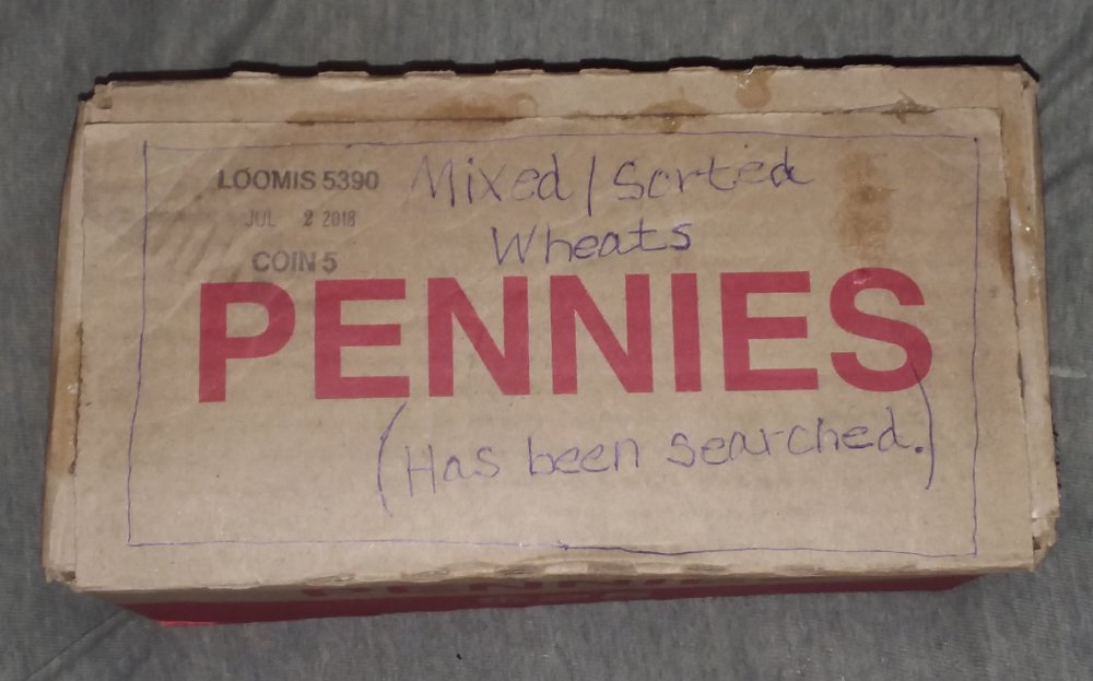 A-Box-Filled-With-Hand-Wrapped-Rolls-Of-Wheat-Cents-From-CRH-Mostly
